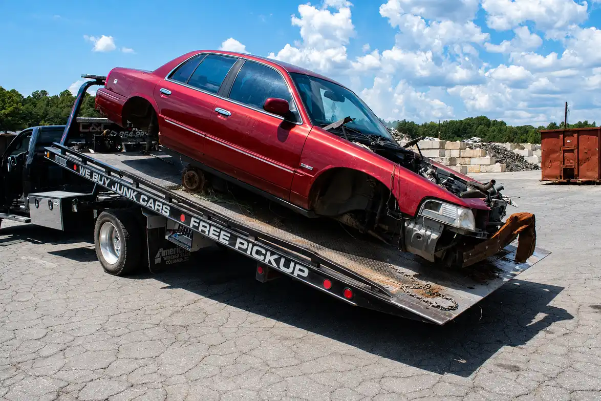 End-of-life car prepared for tow truck scrap car removal