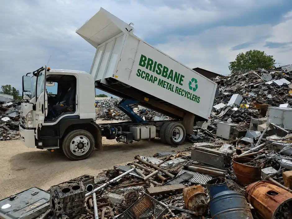 Mixed scrap metal offcuts and pipes loaded in a Brisbane collection truck